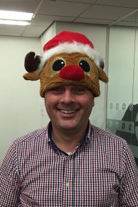 Puffin solutions engineer with reindeer hat
