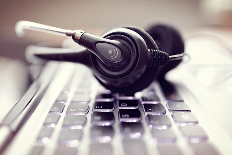 VoIP headset on lit up keyboard