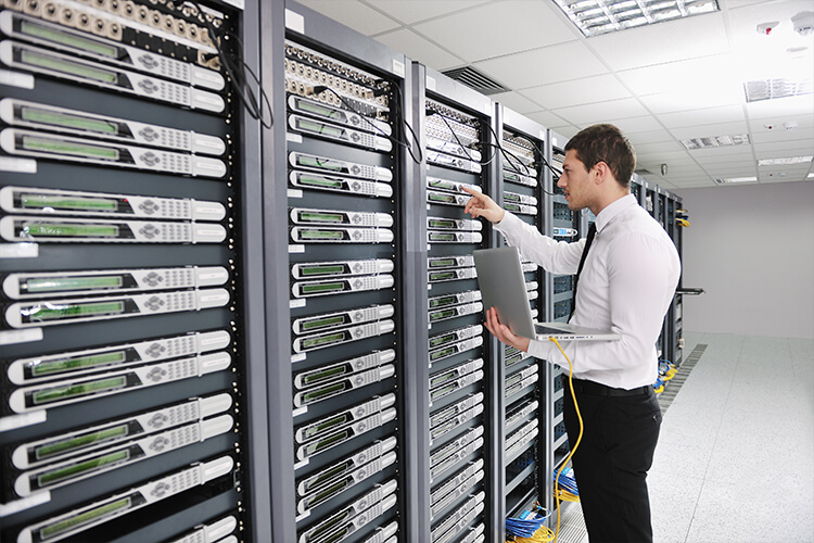 Man looking in data centre