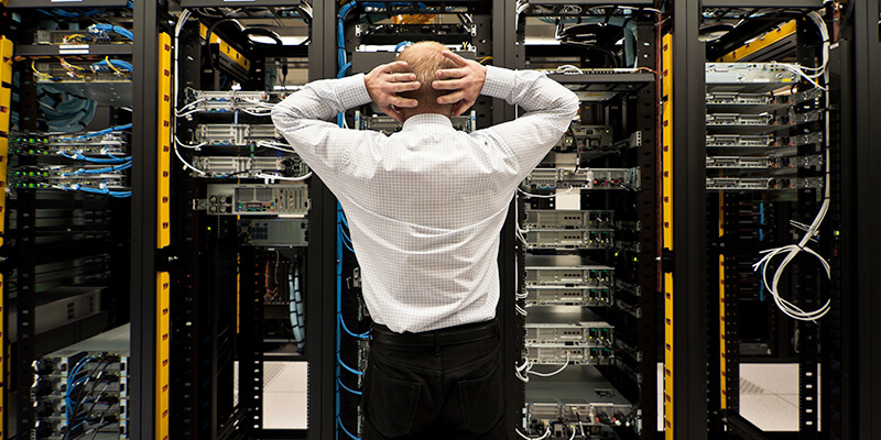 Man not knwoing what to do in data centre